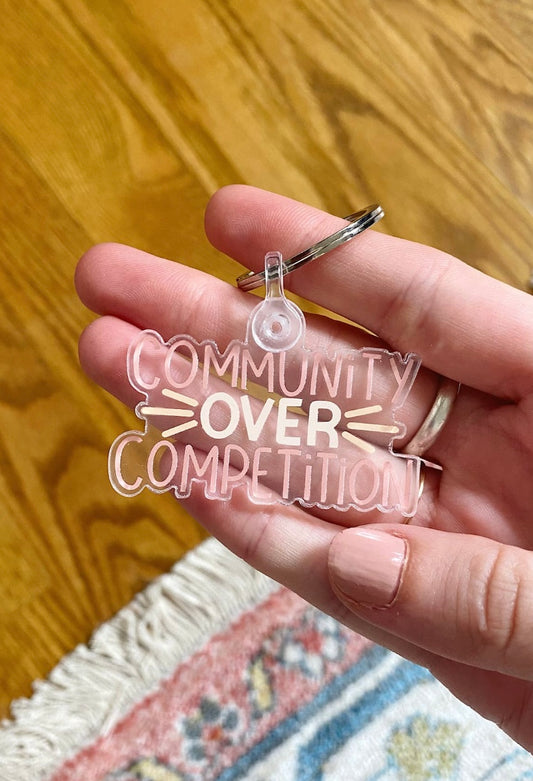 Community Over Competition Key Chain