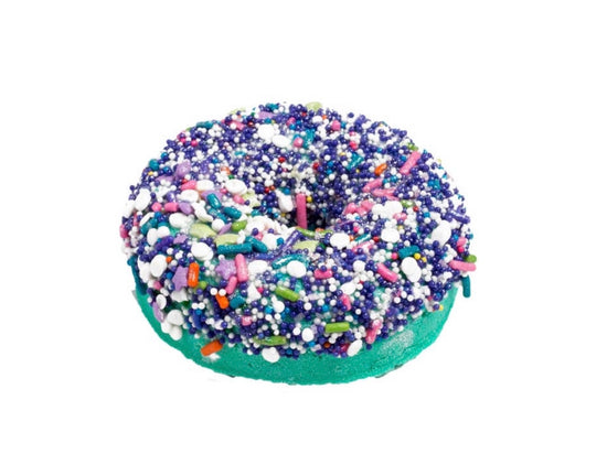 a close up of a doughnut covered in sprinkles 