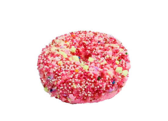 a close up of a doughnut with red sprinkles 