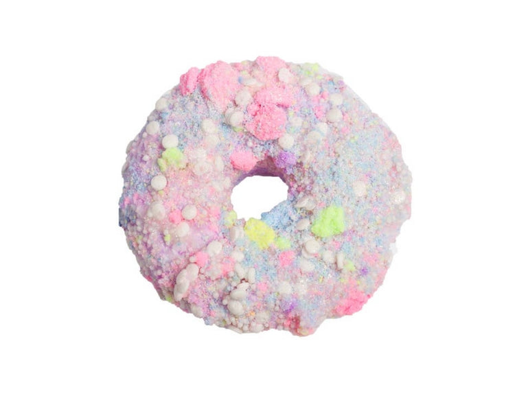 a close up of a pink donut with sprinkles 