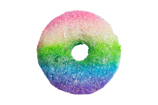 a close up of a doughnut with sprinkles 